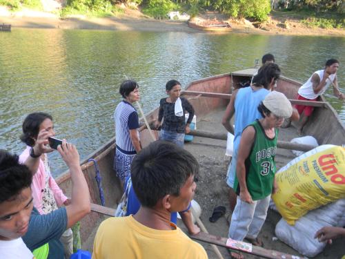 Residents of Brgy. Napo, Inabanga, Bohol, crossing a river to get to the evacuation center. Some 700 evacuees evacuated to the Dagohoy High School, 2 kilometers from their community